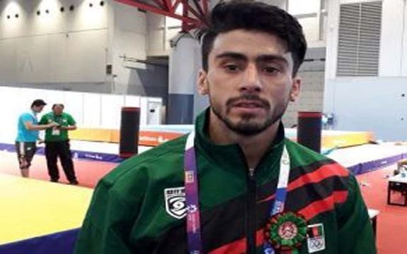 د ووشو افغان لوبغاړي خالد هوتک خپل قزاقستاني سیال ته ماتې ورکړه