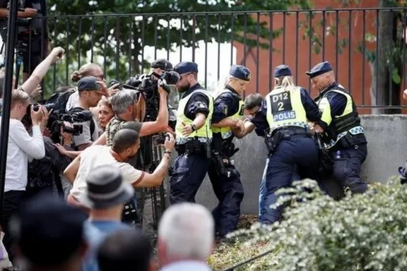 په سويډن کې د قرآن سوځولو غونډه په تاوتریخوالي واوښته او پولیسو ۱۲ کسان ونیول