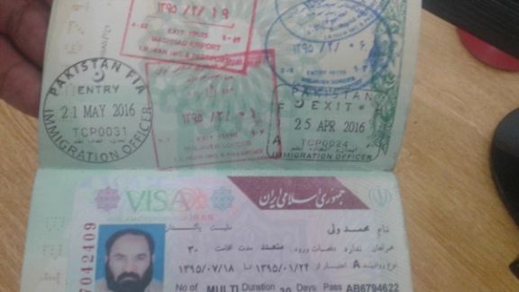 ویزای ایران و مهرهای متعدد ورود و خروج در پاسپورت رهبر کشته شده طالبان