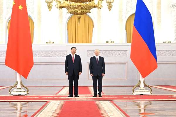 Putin, Xi Pledge Ongoing Cooperation To Build United, Peaceful Afghanistan