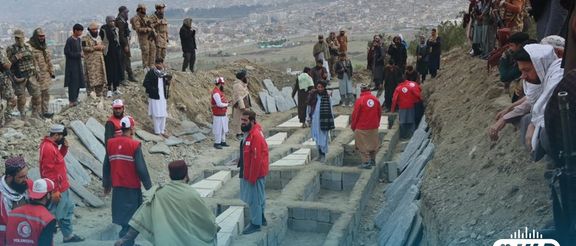 تصویری از خاک سپاری دستهجمعی قربانیان کمپ امید