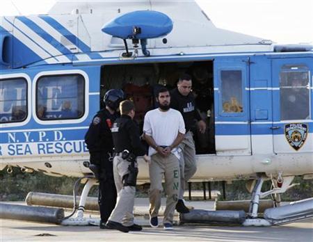 نجیب‌الله زازی در بازداشت پولیس امریکا