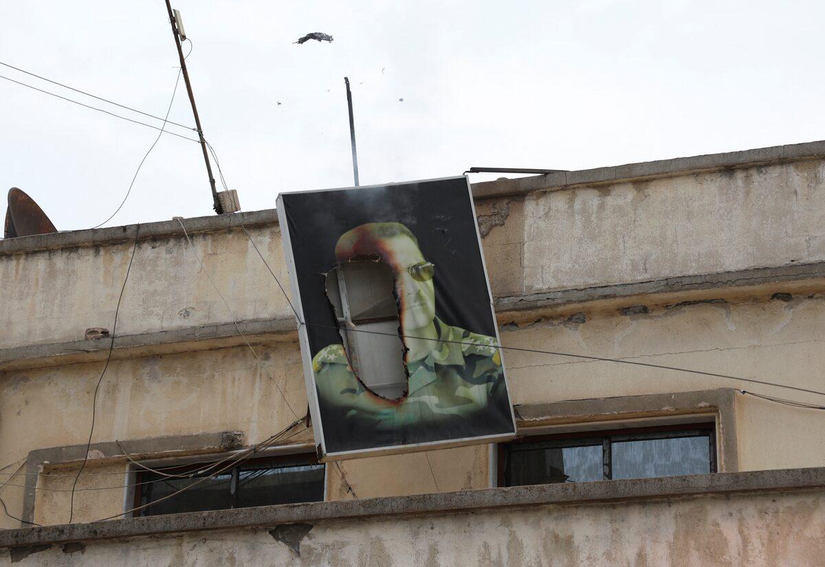 بشار اسد می‌گوید از پایگاه نظامی حمیمیم به طور غیرمنتظره به روسیه منتقل شد