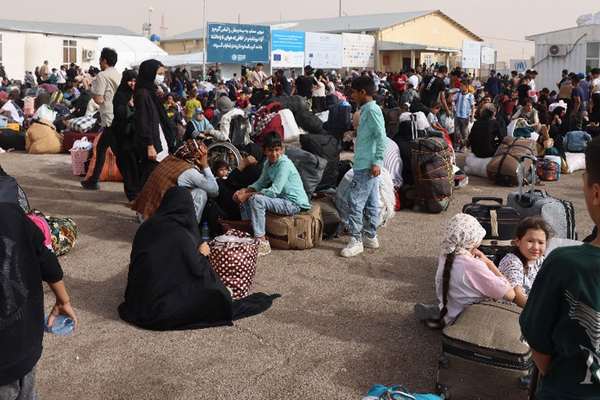 Iran Steps Up Deportations Of Afghans, Schedules Talks With Taliban