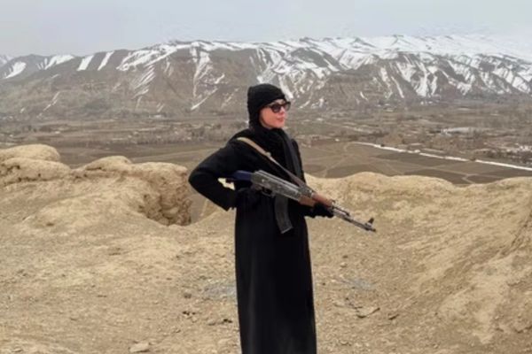 As Afghan Women Face Travel Bans, American Adult Star Poses With AK47 Under Taliban Escort
