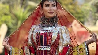 ازبک توکمه ډیزاینره: په ویاړ سره کوچیاني، هزارګي او نورستاني جامې ډیزاین کوم