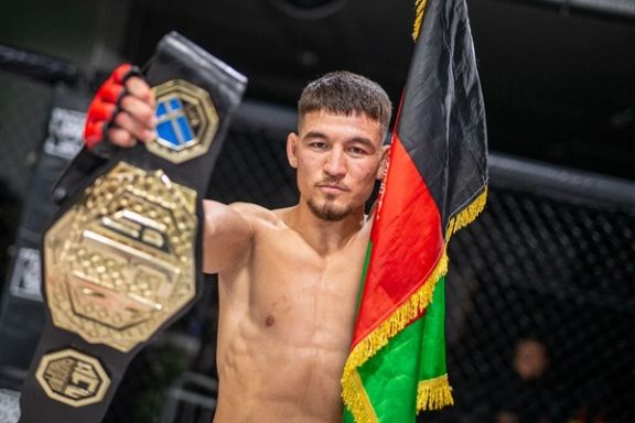 سخی قنبری، ورزشکاران مبارزات آزاد افغانستان حریف پولندی خود را ناک اوت کرد