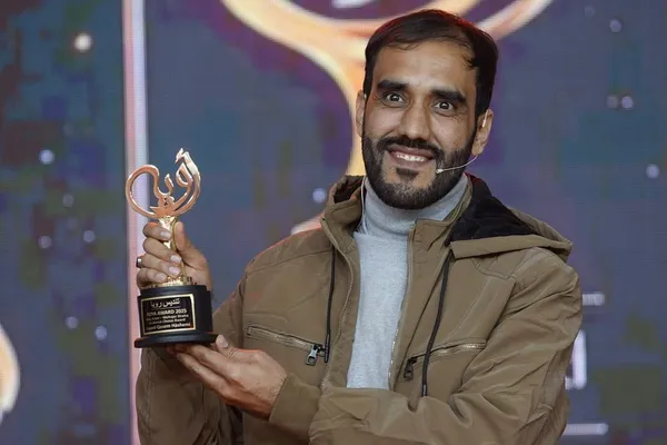 پاکستاني پولیسو افغان خبریال سید قاسم هاشمي نیولی دی