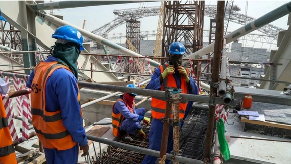 جام جهانی فوتبال در قطر؛ هواداران فوتبال خواستار پرداخت غرامت به کارگران مهاجر شدند